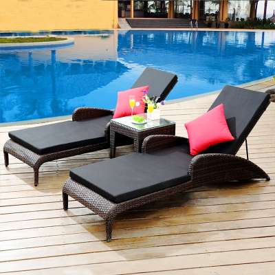 Outdoor poolside rattan sunbed